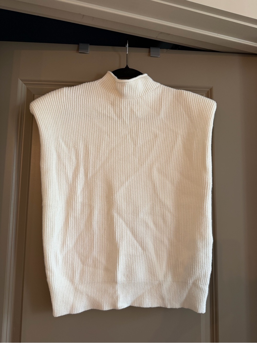 Cream Ribbed Knit Sleeveless Mock Neck Sweater Vest with shoulder pads